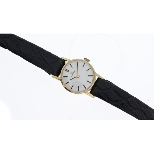 75 - 9ct VINTAGE LADIES OMEGA BOX AND PAPERS 1973, circular silver dial with baton hour markers, 19mm 9ct... 