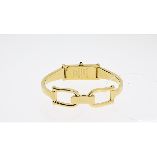 95 - GUCCI BANGLE WATCH REF 1500 L , gold palted, quartz,