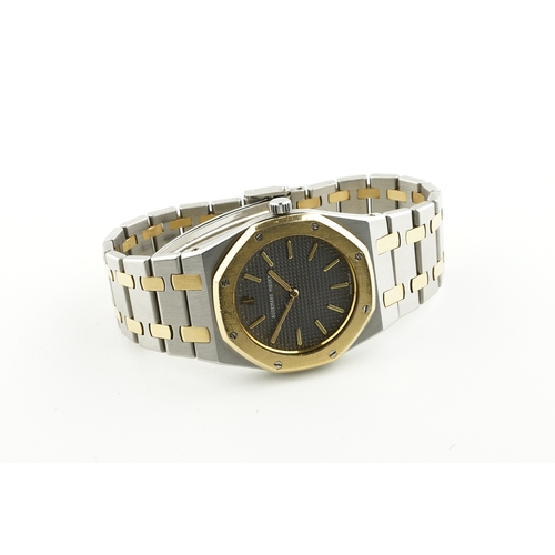 298 - AUDEMARS PIGUET STEEL & GOLD QUARTZ WRISTWATCH NO. 475, circular grey waffle dial with hour markers ... 