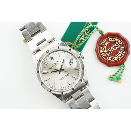 301 - ROLEX OYSTER PERPETUAL DATE W/ GUARANTEE PAPERS & SWING TAG REF. 15210 CIRCA 1997, circular silver d... 