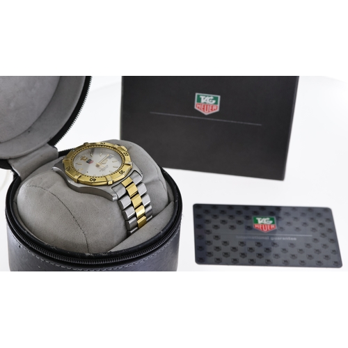 104 - TAG HEUER PROFESSIONAL REF DD3553 W/BOX, approx 38mm silver dial, baton hour markers, date aperture ... 