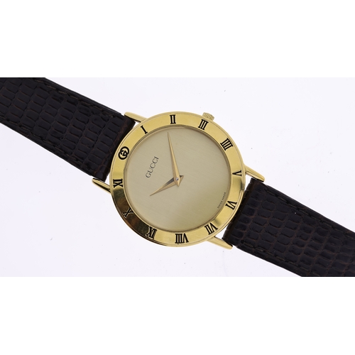 172 - GUCCI WATCH REF 0328300 W/BOX, approx 32mm dial, gold plated bezel engraved with Roman Numeral hour ... 