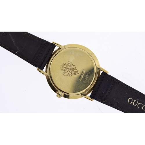 172 - GUCCI WATCH REF 0328300 W/BOX, approx 32mm dial, gold plated bezel engraved with Roman Numeral hour ... 