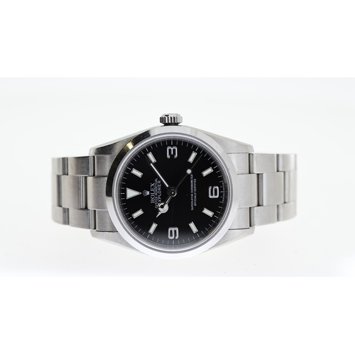 38 - ROLEX EXPLORER REFERENCE 114270 CIRCA 2009, circular gloss black dial with applied baton hour marker... 