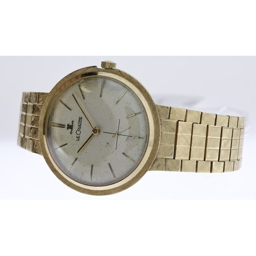 44 - VINTAGE 14K LE COULTRE CIRCA 1970S,  circular cream dial with baton hour markers, integrated 14k bra... 