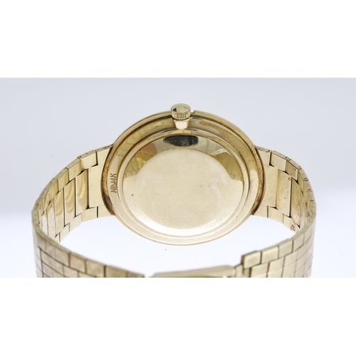 44 - VINTAGE 14K LE COULTRE CIRCA 1970S,  circular cream dial with baton hour markers, integrated 14k bra... 