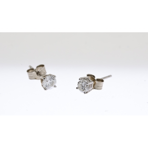 1029 - 18CT WHITE GOLD DIAMOND STUD EARRINGS APPROX 0.5CT, overall reasonable clarity, hallmarked 750 with ... 