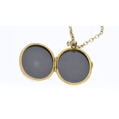 1031 - 9CT YELLOW GOLD LOCKET W/ APPROX 7.6G AQUAMARINE STONE, approx 20mm hinged case width, multiple phot... 