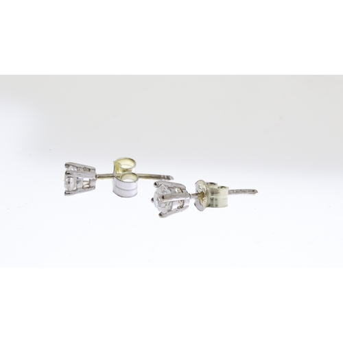 1033 - 9CT WHITE GOLD DIAMOND STUD EARRINGS (0.16CT EACH), hallmark visible on butterfly back,