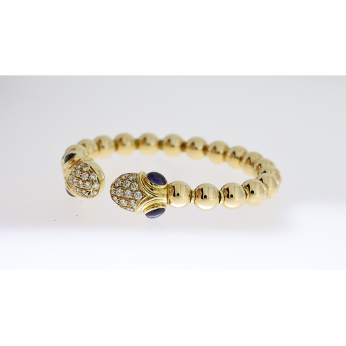 1002 - Fine 18ct gold Chatila diamond sapphire bangle, set with estimated 1.7 carats diamonds. Weighs 32 gr... 