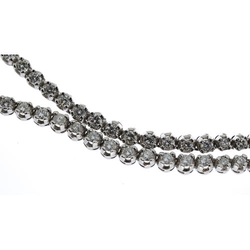 1005 - Fine 18ct gold designer KOJIS diamond necklace. Set in white gold with an estimated 8 carats of diam... 