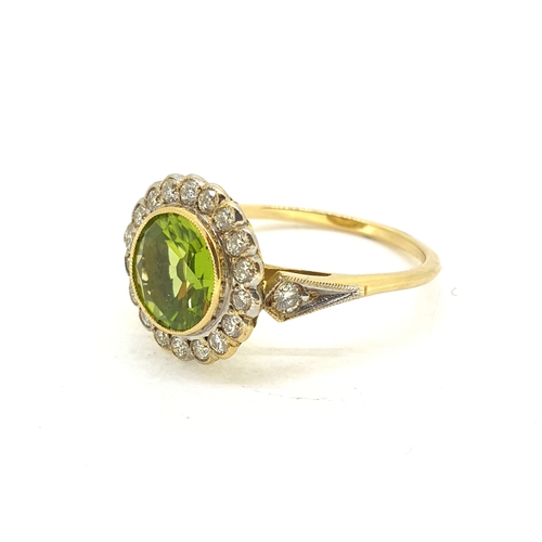 1016 - Round peridot and diamond cluster ring in yellow gold.
Peridot 1.80 carats, Diamonds 0.50 carats. St... 