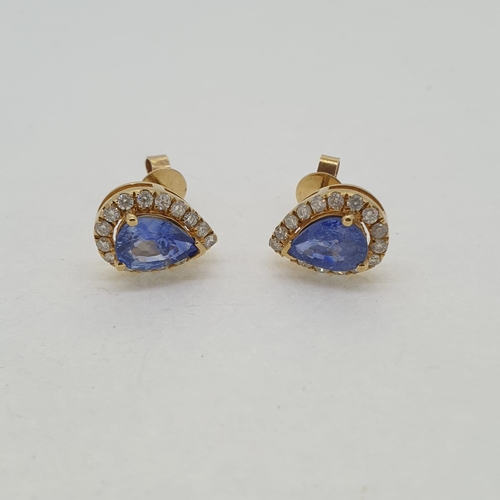 1026 - Pear shaped sapphire and diamond cluster earrings no
weights. Earrings are marked 585