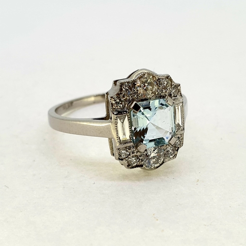 1027 - Aquamarine and diamond tablet ring with prominent
baguette diamonds. Aquamarine 0.80 carats Diamond
... 