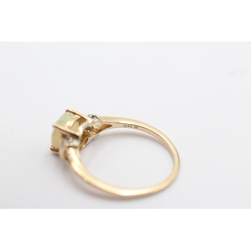 1048 - 9ct Gold Opal & White Sapphire Dress Ring (1.8g)