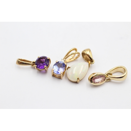 1080 - 4 X 9ct Gold Gemstone Set Pendants Inc. Opal, Pink Sapphire, Tanzanite & Amethyst (2.1g)