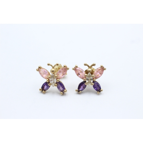 1081 - 9ct Gold Amethyst & Clear Gemstones Butterfly Stud Earrings (1.8g)