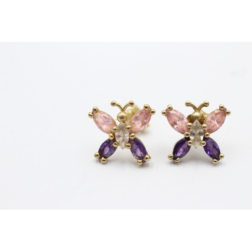 1081 - 9ct Gold Amethyst & Clear Gemstones Butterfly Stud Earrings (1.8g)