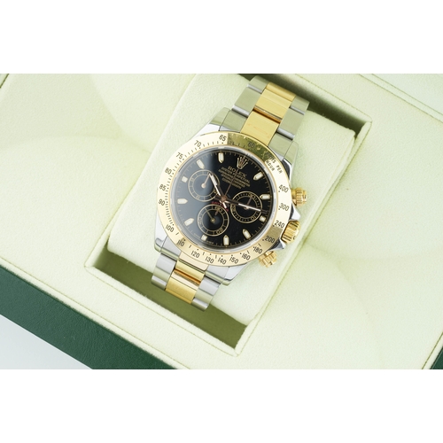 397 - ROLEX OYSTER PERPETUAL COSMOGRAPH DAYTONA STEEL & GOLD REF. 116523 CIRCA 2005, circular black triple... 