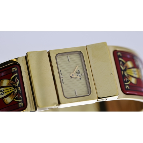 112 - HERMES PARIS REF LO1 200 W/BOX, approx 18mm champagne dial, gold plated bezel and Hermes case, patte... 