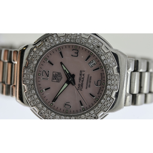 124 - LADIES TAG HEUER FORMULA 1 REFERENCE WAC1216,  pink dial with diamond set bezel, 38 mm case (inc cro... 