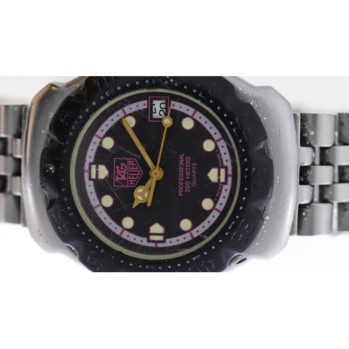 126 - TAG HEUER X FORMULA 1 PROFESSIONAL REF 377.513, approx 34mm black and pink dial with round hour mark... 