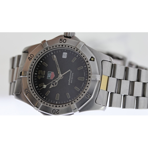 134 - TAG HEUER PROFESSIONAL REF WK1121 W/BOX, approx 35mm black dial with baton hour markers, date apertu... 