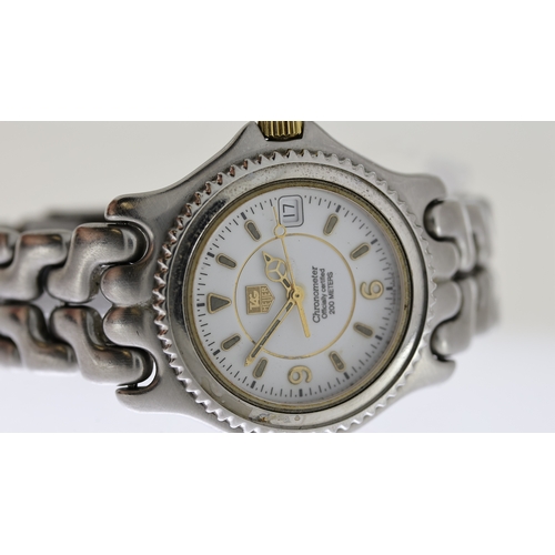 140 - TAG HEUER CHRONOMETER REF 04627, approx 35mm white dial with baton & Arabic hour markers, date apert... 