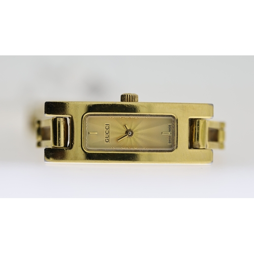 218 - LADIES GUCCI REF 3900L, approx 12mm gold dial, gold plated bezel and case, Gucci crown, gold plated ... 