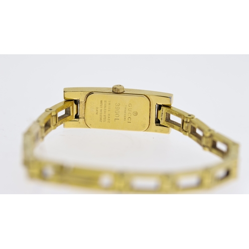 218 - LADIES GUCCI REF 3900L, approx 12mm gold dial, gold plated bezel and case, Gucci crown, gold plated ... 