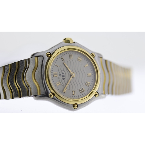 231 - 18CT EBEL WAVE REF 1157111, approx 23mm wave-effect grey dial with gold Roman Numeral hour markers, ... 