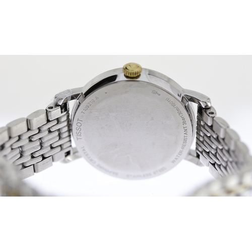 241 - TISSOT REF T109210A, approx 28mm white dial with gold baton hour markers, stainless steel bezel and ... 