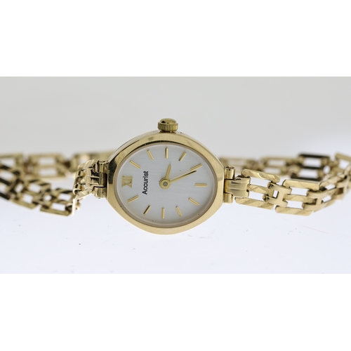 282 - LADIES ACCURIST 9CT GOLD COCKTAIL WATCH W/BOX & PAPERS, approx 14mm silver dial with baton hour mark... 