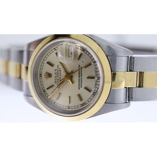 66 - LADIES ROLEX DATEJUST 26 STEEL & GOLD W/BOX, approx 24mm circular champagne dial with baton hour mar... 