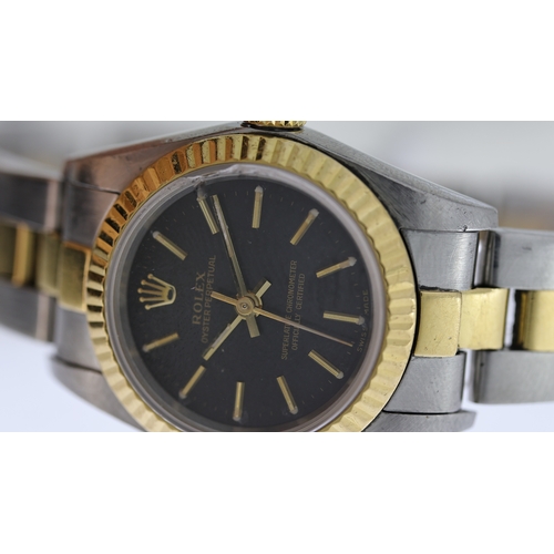 71 - LADIES ROLEX OYSTER PERPETUAL REFERENCE 76193, black dial with gold baton hour markers, fluted bezel... 