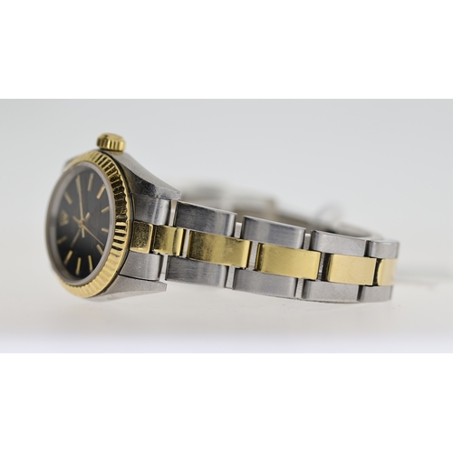 71 - LADIES ROLEX OYSTER PERPETUAL REFERENCE 76193, black dial with gold baton hour markers, fluted bezel... 