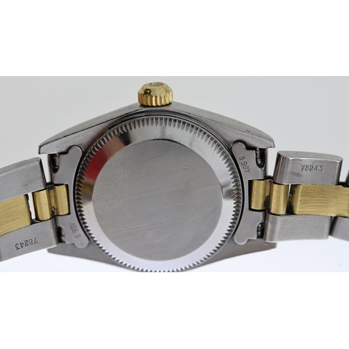71 - LADIES ROLEX OYSTER PERPETUAL REFERENCE 76193, black dial with gold baton hour markers, fluted bezel... 