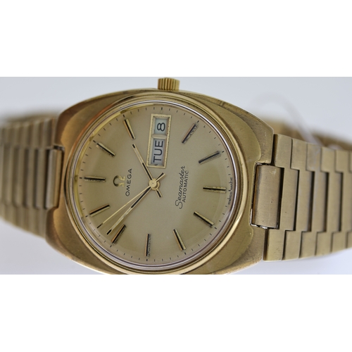 92 - OMEGA SEAMASTER DAY DATE AUTOMATIC CIRCA 1970's, circular champagne dial with baton hour markers, da... 