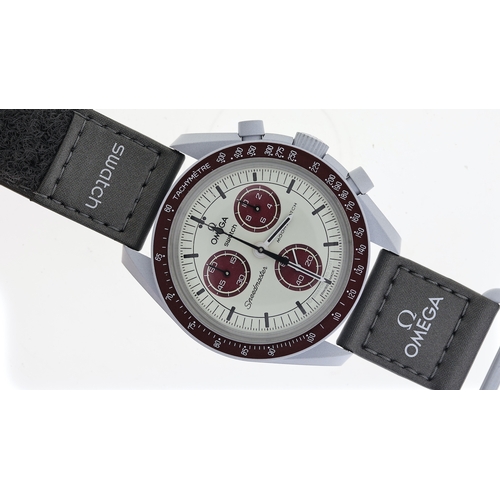 98 - OMEGA MOONSWATCH SPEEDMASTER MISSION TO PLUTO WITH BOX,  grey blue case, burgundy detail and strap q... 