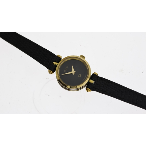 346 - LADIES GUCCI W/BOX, approx 20mm black dial, gold plated bezel, Gucci crown and case, black leather s... 