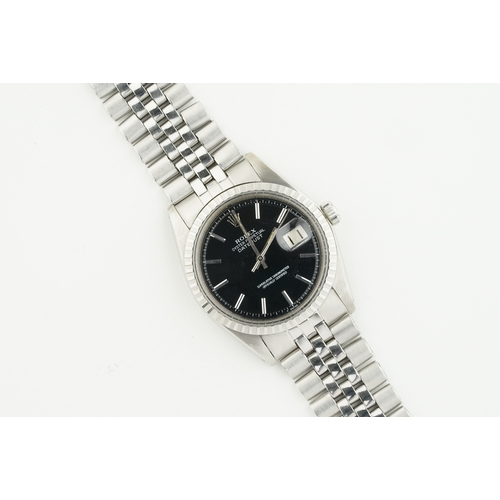 330 - ROLEX OYSTER PERPETUAL DATEJUST W/ GUARANTEE REF. 1603 CIRCA 1973, circular black dial with hour mar... 