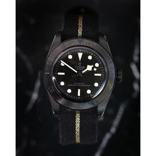 1 - TUDOR BLACK BAY CERAMIC REFERENCE 79210CNU BOX AND PAPERS 2022, circular black dial with applied hou... 