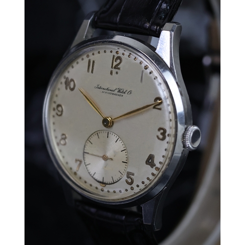 27 - VINTAGE IWC MECHANICAL WRISTWATCH CIRCA 1940s, circular silver dial with arabic numeral hour markers... 