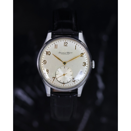 27 - VINTAGE IWC MECHANICAL WRISTWATCH CIRCA 1940s, circular silver dial with arabic numeral hour markers... 