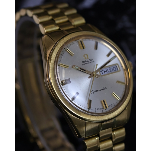 52 - 18CT OMEGA SEAMASTER AUTOMATIC REFERENCE 166.032 CIRCA 1967, circular sunburst silver dial with bato... 