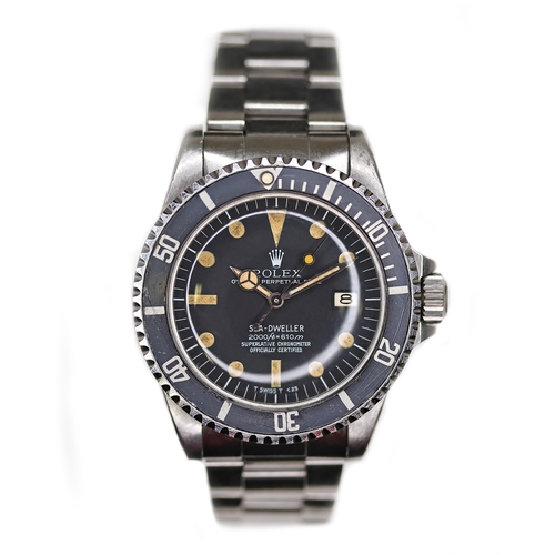 76 - RARE ROLEX SEA DWELLER 'RAIL DIAL' REFERENCE 1665 CIRCA 1978, circular matte black dial with pumpkin... 