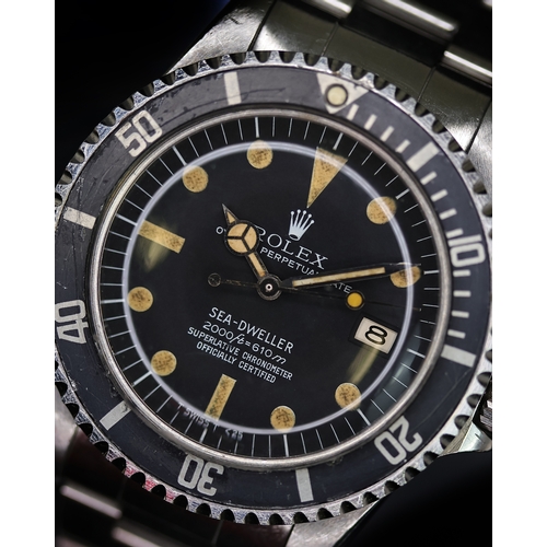 76 - RARE ROLEX SEA DWELLER 'RAIL DIAL' REFERENCE 1665 CIRCA 1978, circular matte black dial with pumpkin... 