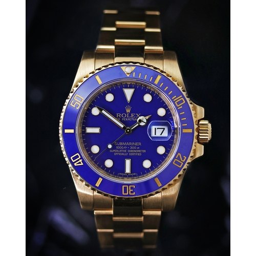 9 - 18CT ROLEX SUBMARINER REFERENCE 116618, circular blue dial with applied hour markers, mercedes hands... 