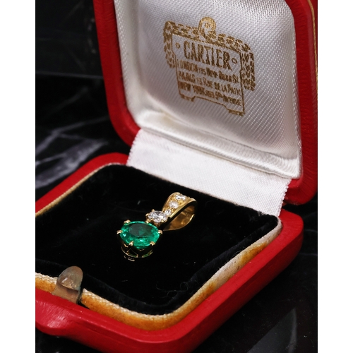 90 - CARTIER EMERALD AND DIAMOND PENDANT, feature round cut emerald, suspended from a brilliant cut diamo... 