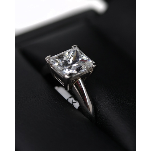 93 - 3.10CT DIAMOND RING, rectangular cut diamond, claw set, mounted in platinum, estimated colour and cl... 